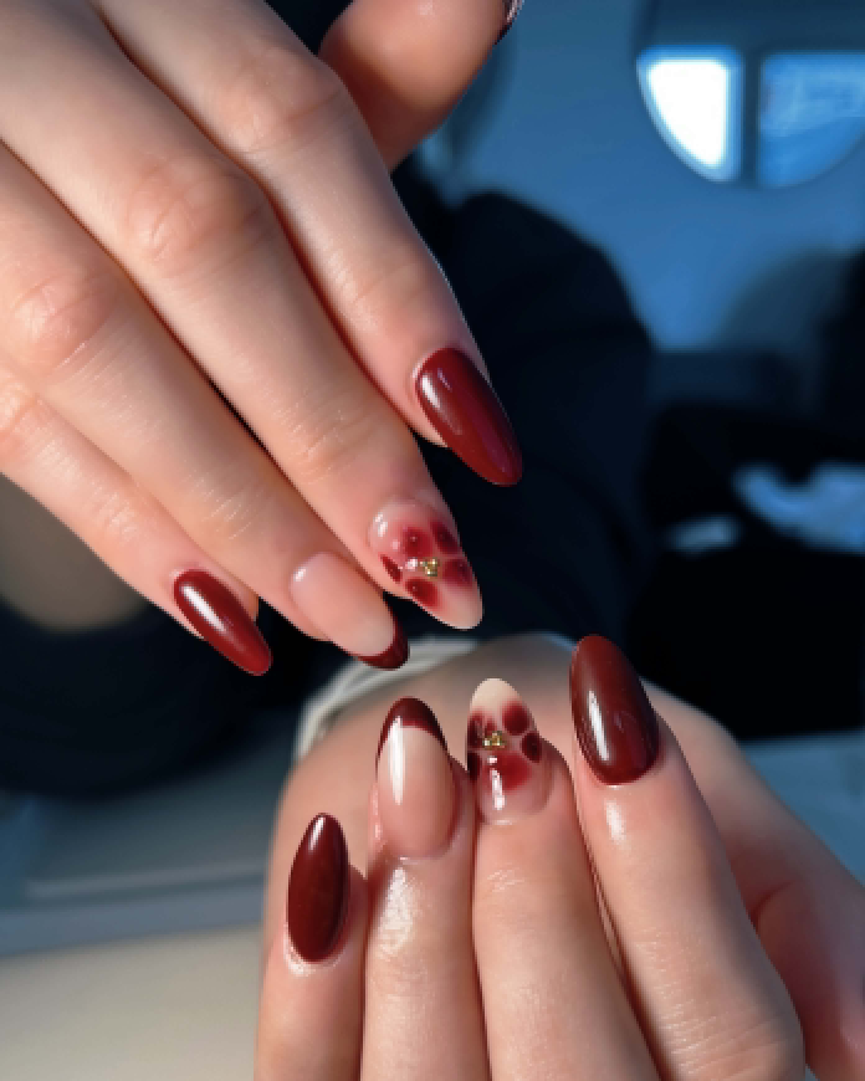 GiGi Nails Vantaa — glossy burgundy gel manicure